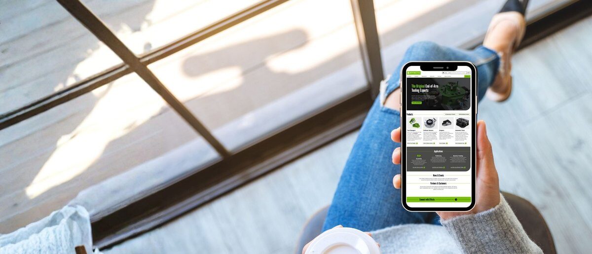 A woman using a phone on the Effecto website